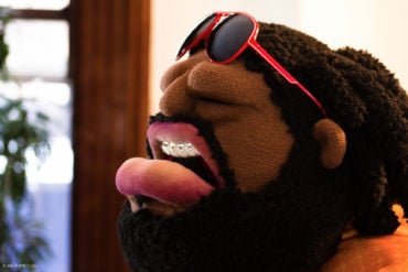 Custom puppet - a guys with locks and red sunglasses