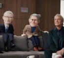 Andy Cohen and Anderson Cooper puppet, sitting on couch near Andy Cohen