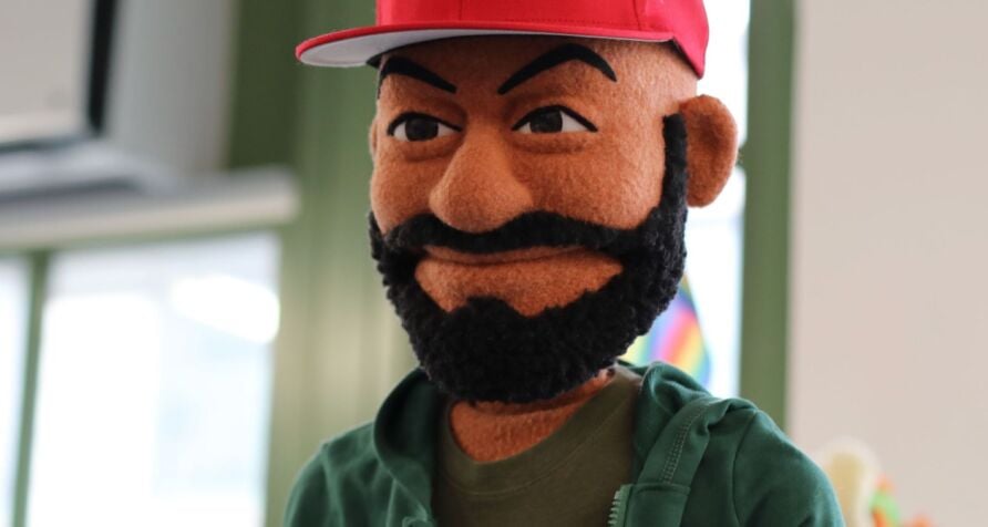 Puppet in the likeness of Desus Nice. Close up shot.