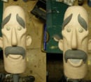 Puppet sculpture - mustached man